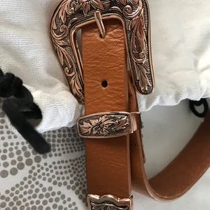 B-low the belt.  Baby bri bri in cognac, medium